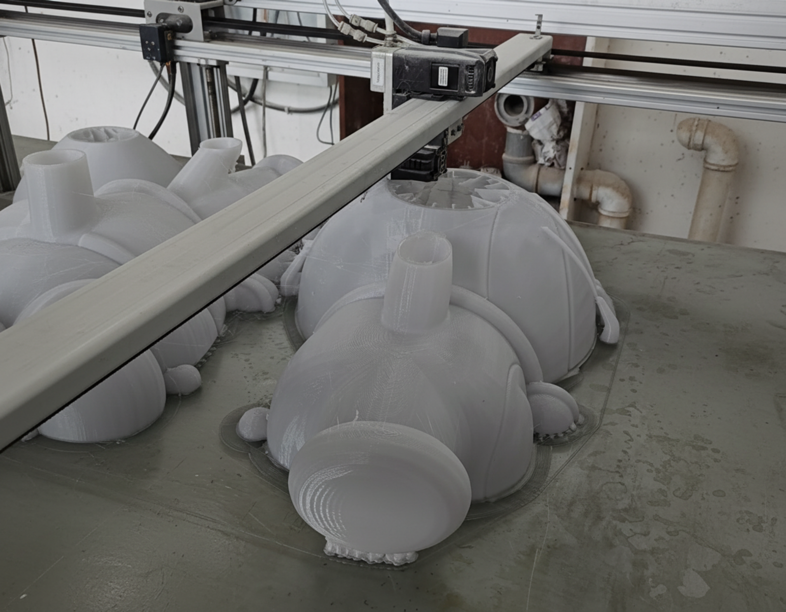 Industrial large-format 3D printer at MorphicFab workshop, producing a 1:1 scale master mold with high precision for a custom sculpture project.