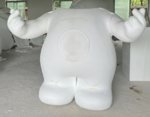 Large-scale 3D-printed mascot (raw assembly stage) in MorphicFab workshop